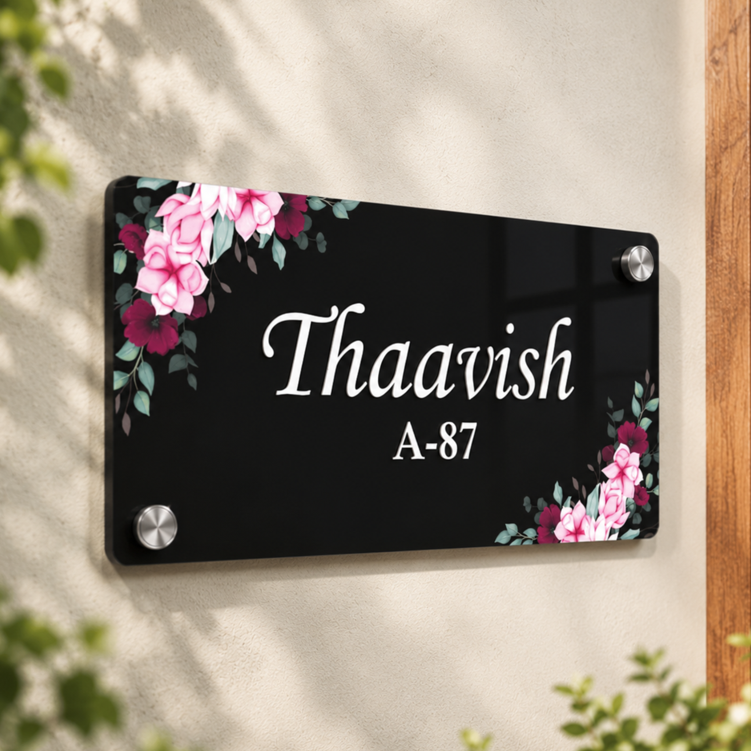 Black acrylic door name plate with pink floral border, Thauvish A-87, 4 silver corner screws