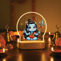 LED table lamp with glowing arch, baby Shiva figure, and wooden base