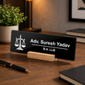 Black acrylic desk plate with scales icon: Adv. Suresh Yadav, B.A. LLB