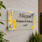 Transparent acrylic door name plate with yellow floral border and metal corner screws