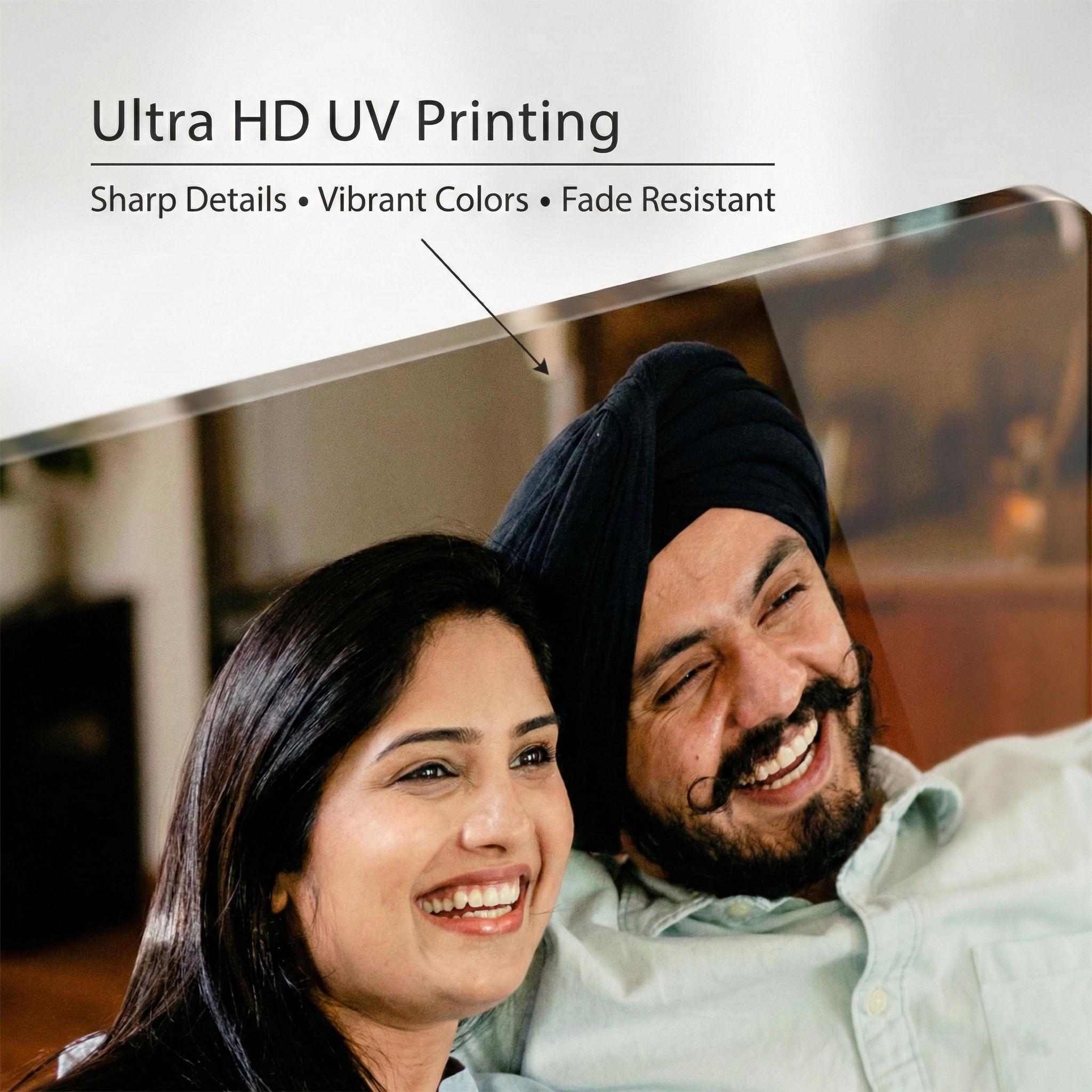 Clear acrylic photo print close-up showing a couple portrait on the surface
