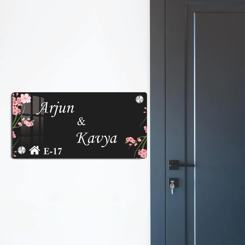 Black acrylic door name plate with cherry blossoms, Arjun & Kayya, E-17; corner bolts