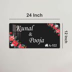 24 inch black acrylic door name plate with floral corners and engraved text, Kunal & Pooja