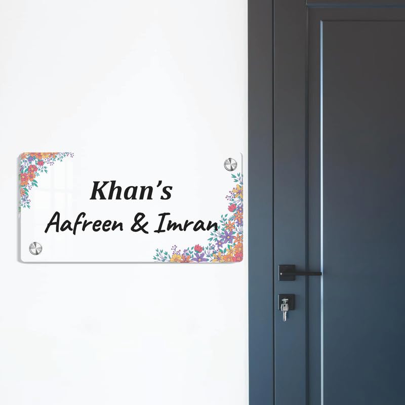 Transparent acrylic name plate with floral corners and engraved “Khan’s Afreen & Imran”