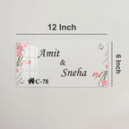 Transparent acrylic door name plate with cherry blossom design: Amit & Sneha, C-78, 12 inch.