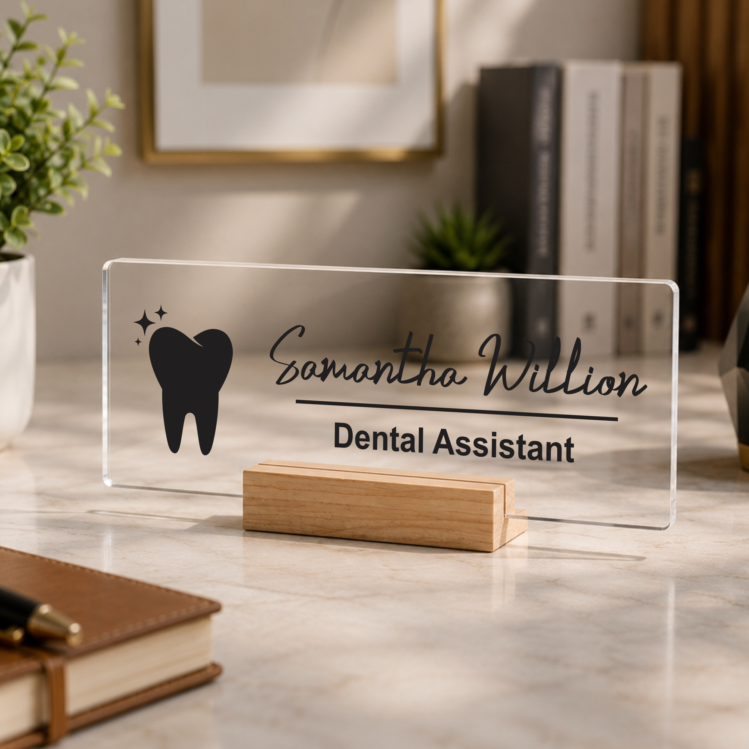 Clear acrylic desk name plate with tooth icon, Samantha Willion, Dental Assistant, on stand