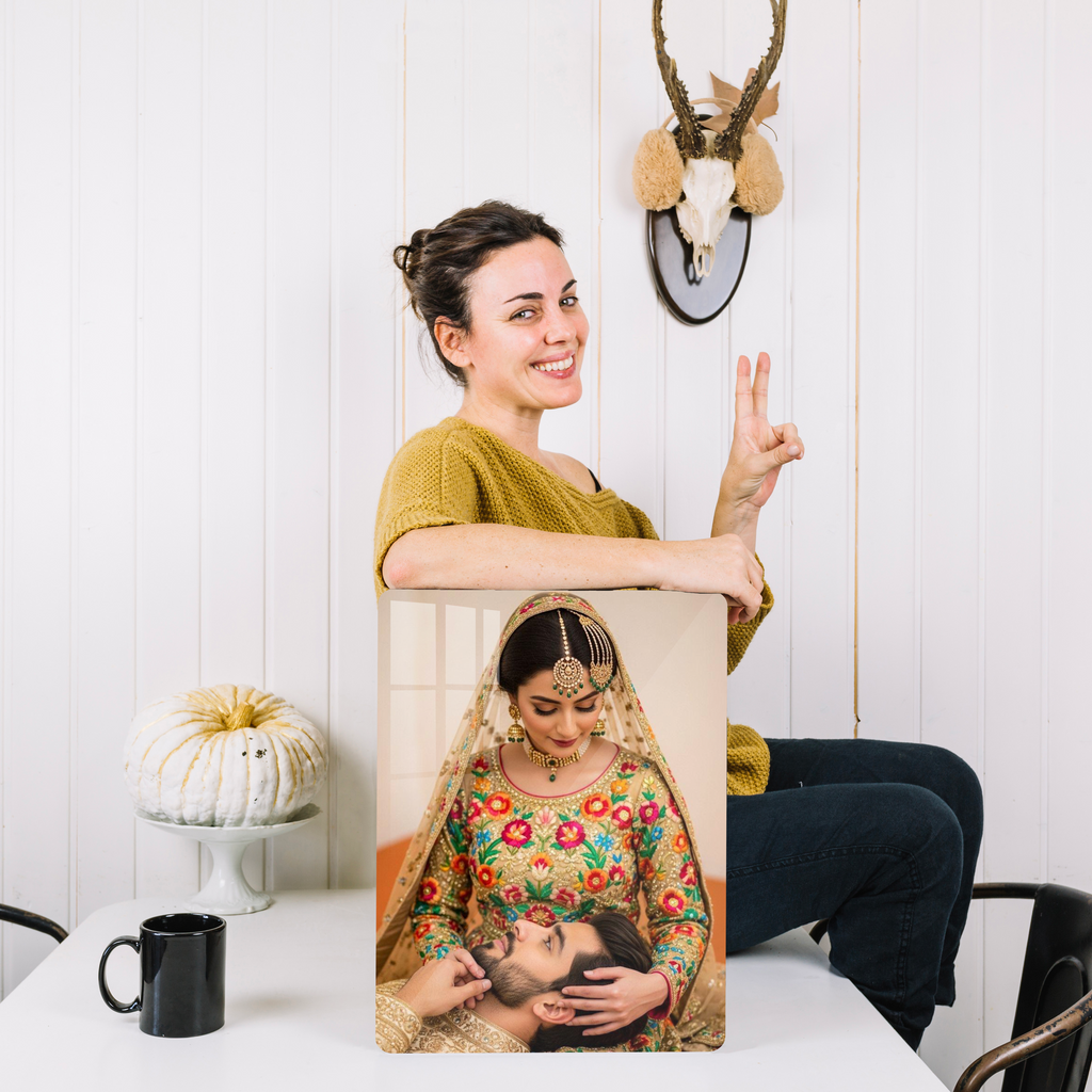 Crystal clear acrylic wall photo frame with a portrait of a woman holding a baby.