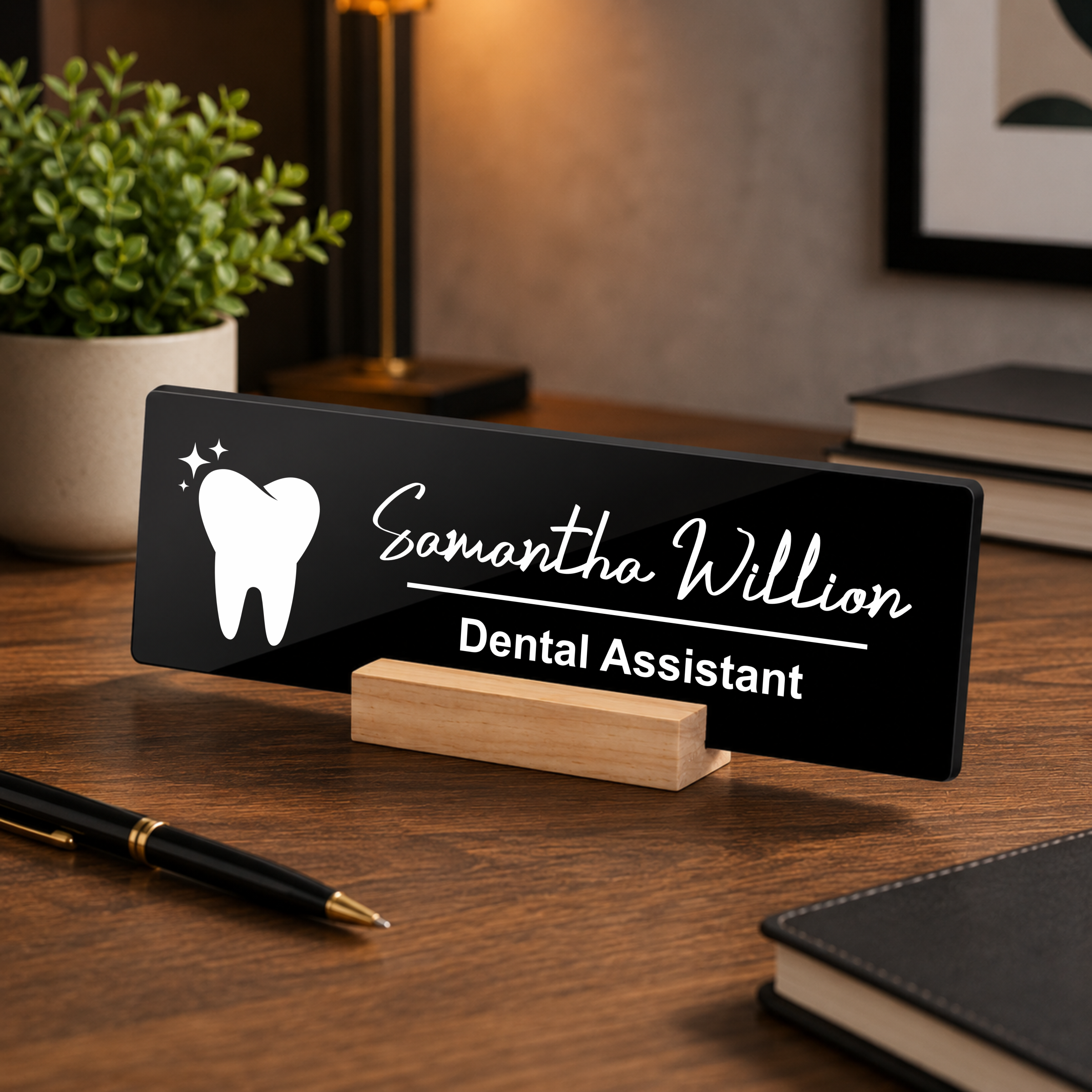 Black acrylic desk name plate, white tooth icon and name script, “Dental Assistant”, wood stand