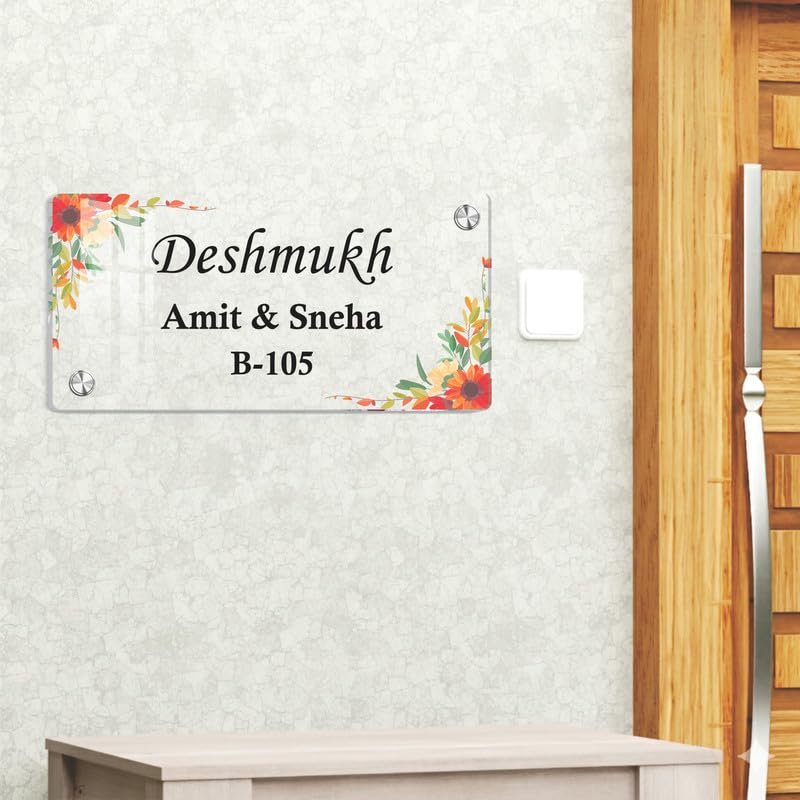 Transparent acrylic door sign with floral border; Deshmukh names and B-105.