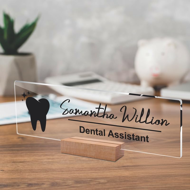 Clear acrylic desk name plate at angle with tooth icon, Samantha Willion, Dental Assistant, wood stand