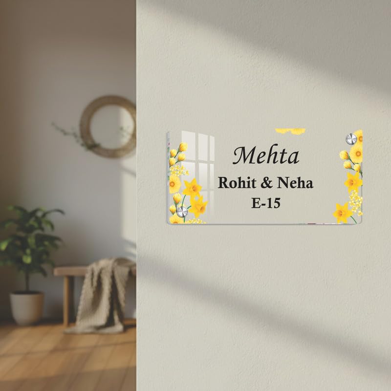 Transparent acrylic door name plate with yellow floral border and screw-mounted corners