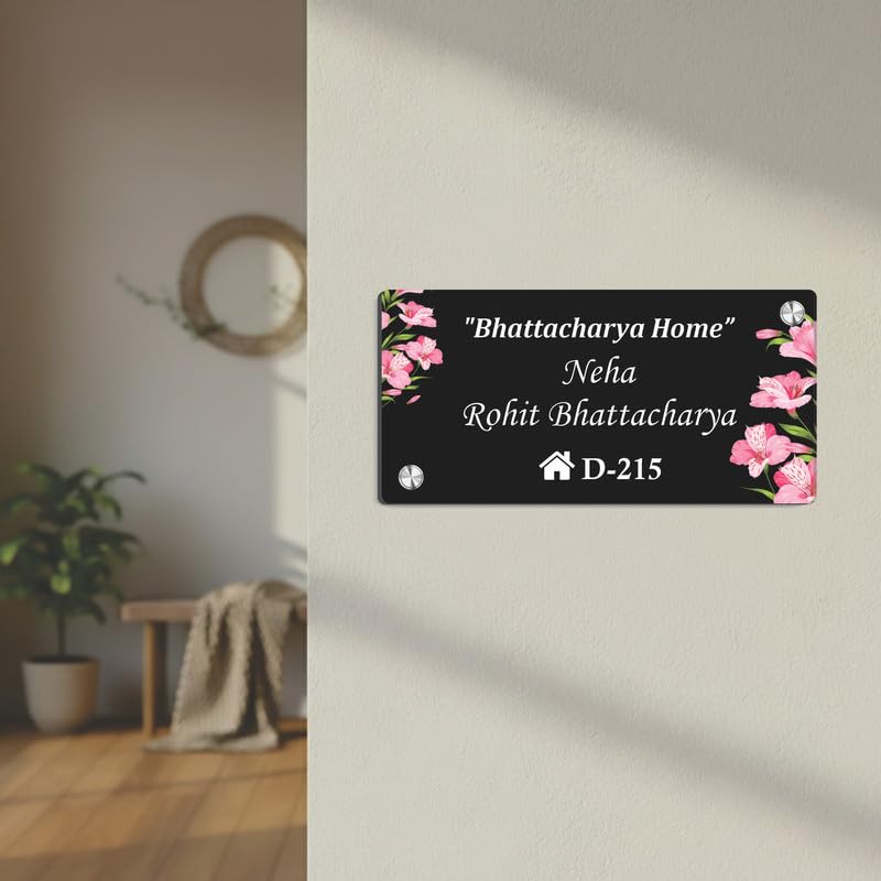 Black acrylic door name plate with floral corner accents, house number D-215