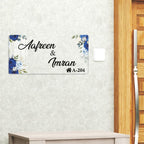 Transparent acrylic door name plate: Aafreen & Imran, blue floral corners, A-204