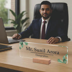 Clear acrylic desk name plate with engraved name and designation, green botanical leaf accents