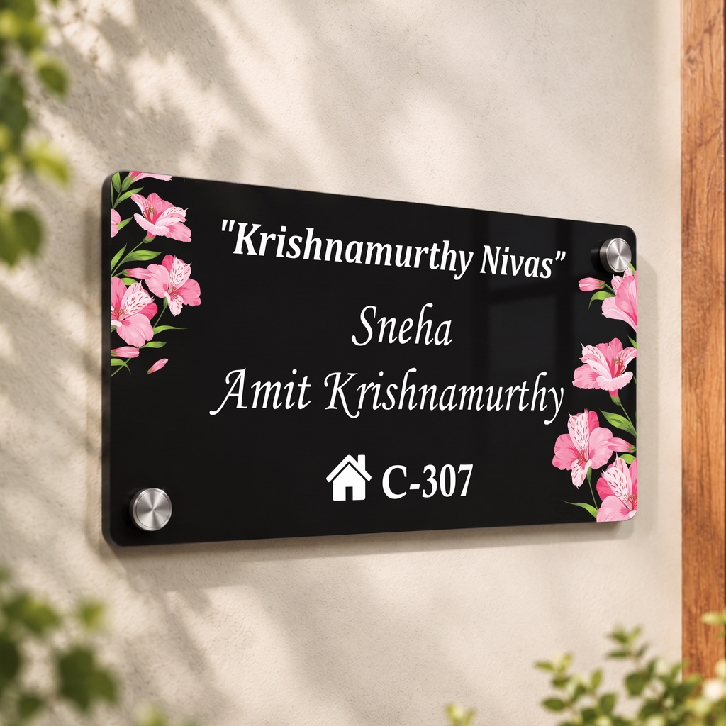 Black acrylic door name plate with floral corner accents, house number C-307