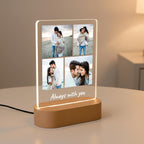 LED acrylic photo frame on wood base with four-photo collage and white glowing outline