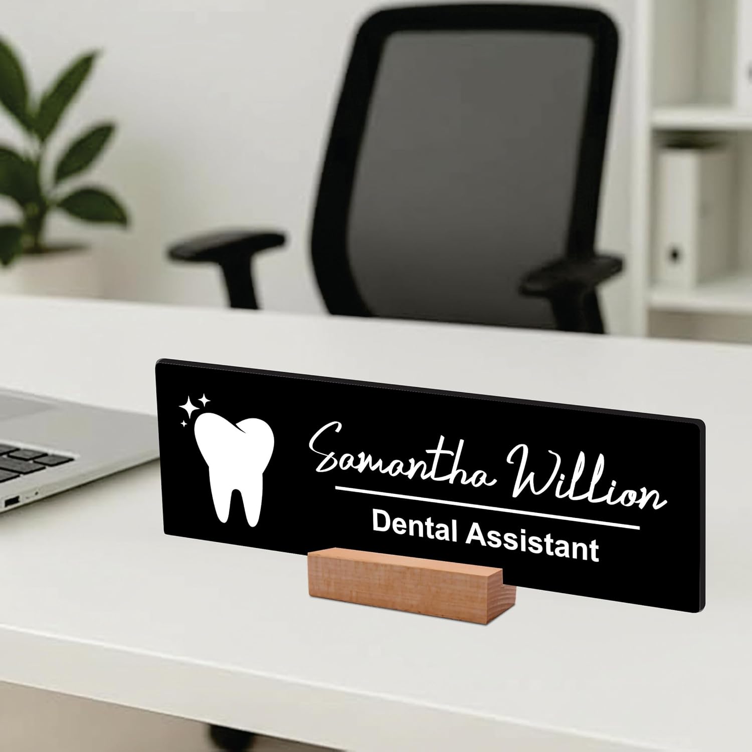 Black acrylic desk name plate with white tooth icon, name script, “Dental Assistant”, wood stand