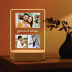 LED acrylic photo frame on light wood base with glowing outline and three-photo collage