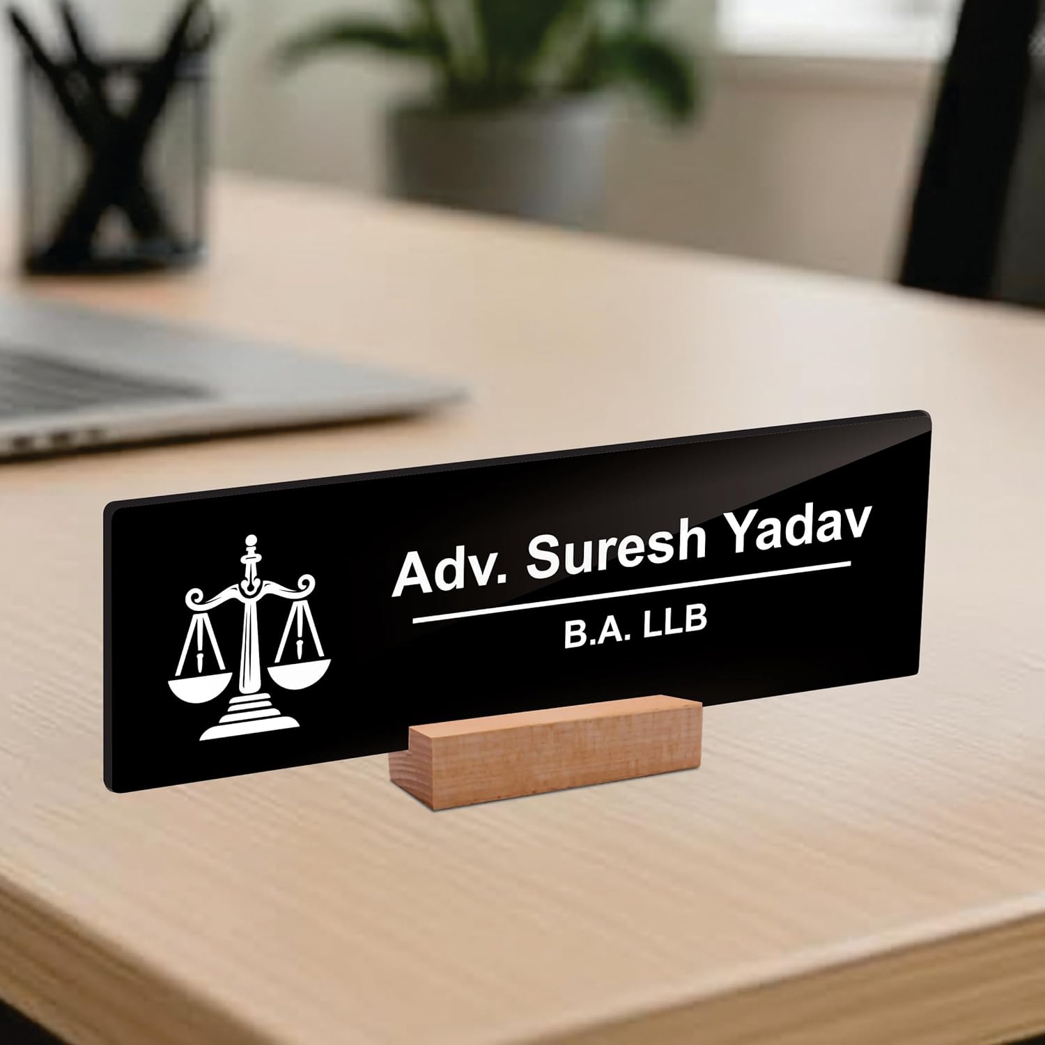 Black acrylic desk plate with scales icon on wood stand: Adv. Suresh Yadav, B.A. LLB