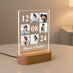 LED acrylic photo frame with 3 photo slots, glowing white outline and warm wooden base