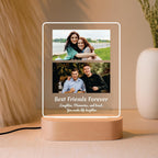 LED acrylic photo frame with two photos, warm glow border and wood base