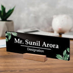 Black acrylic desk name plate with Mr. Sunil Arora and Designation text