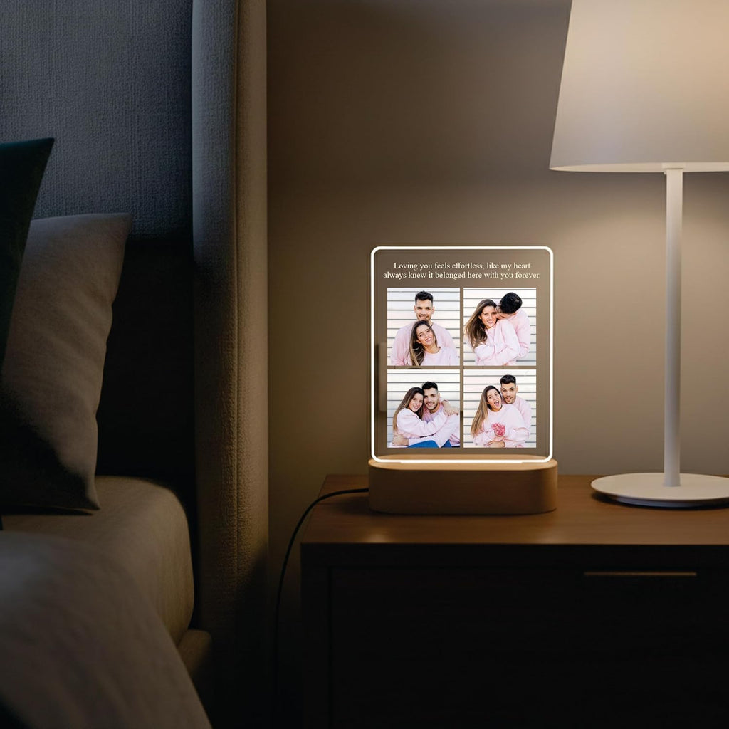 LED acrylic photo frame with warm glowing border and four-photo collage on wood base