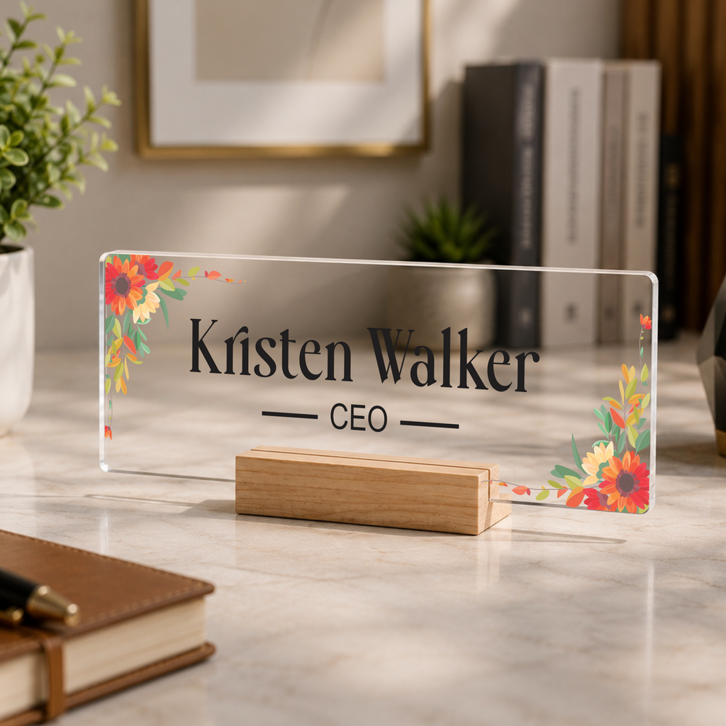 Transparent acrylic desk name plate, floral border, engraved name and CEO, with wooden stand