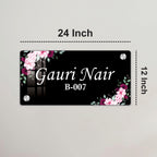 Black door name plate with pink floral corners, "Gauri Nair" B-007, 24 inch