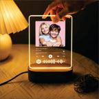 Glowing acrylic photo music frame with a small photo inside and touch control glow