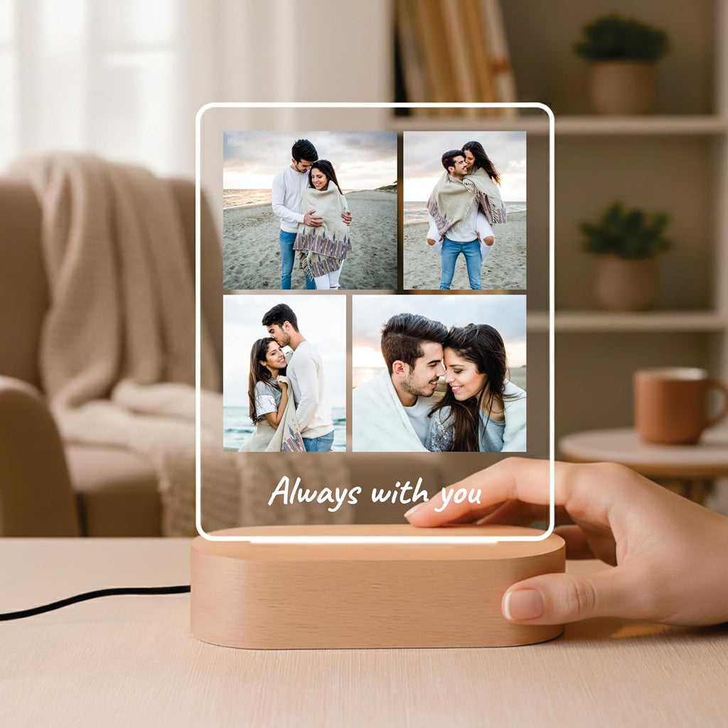 LED acrylic photo frame on wood base held in hand, showing four-photo collage