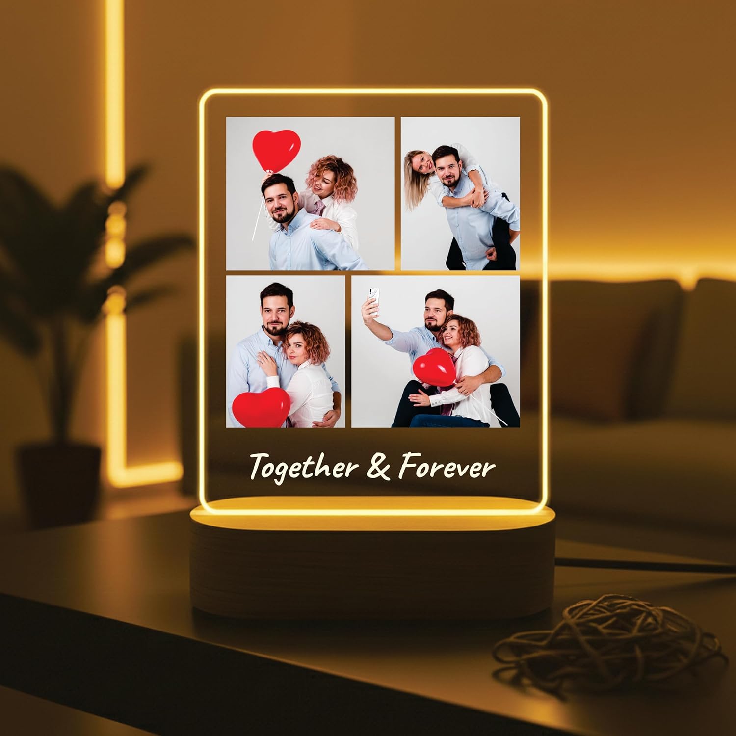 LED acrylic photo frame on wood base with four photos, red hearts, and glowing border