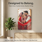 Clear acrylic wall photo frame with glossy finish and a couple portrait in red outfits