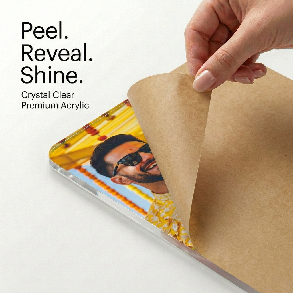 Acrylic photo frame with protective film peeled away from clear cover