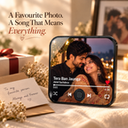 Music photo fridge magnet on countertop with photo screen, play buttons, and heart icon