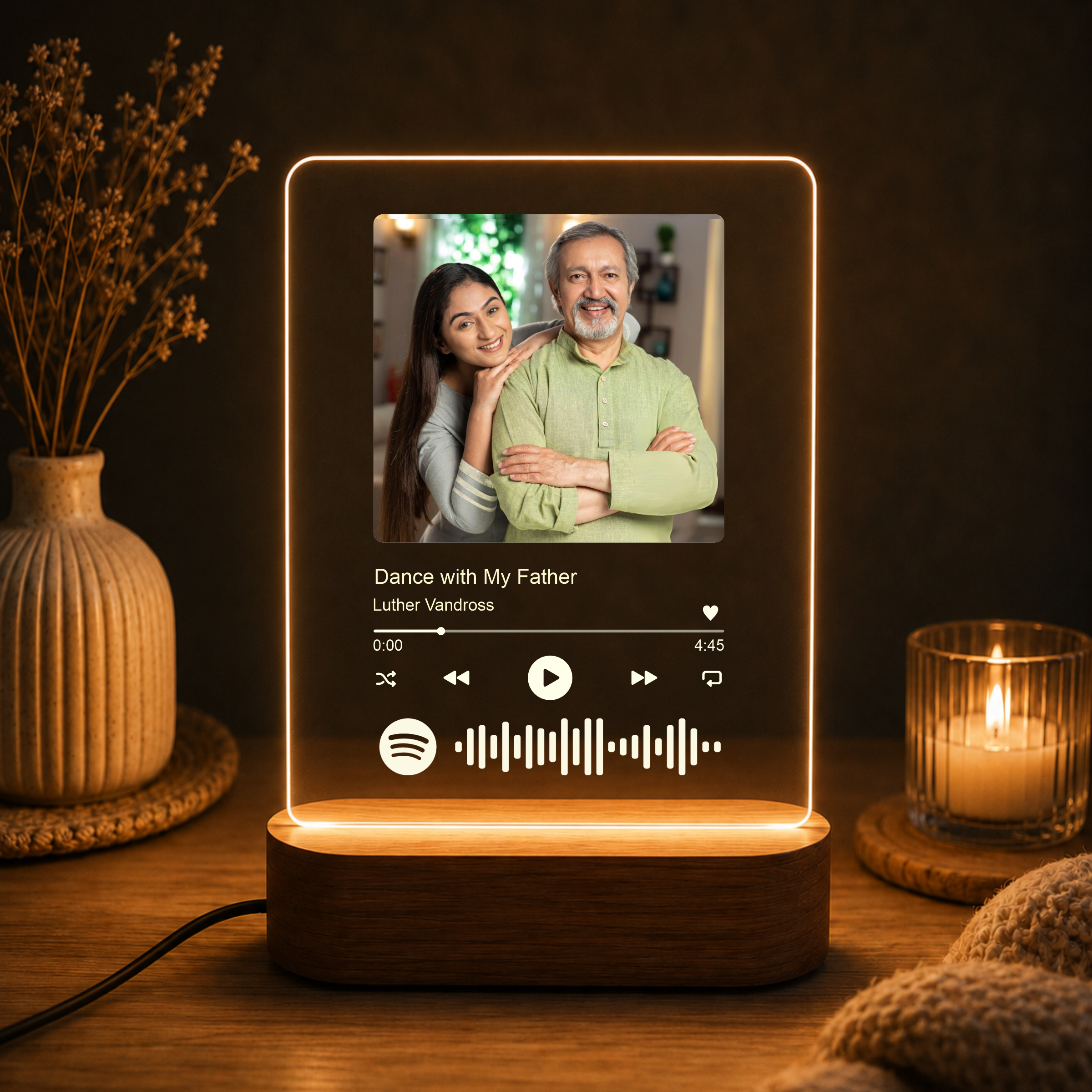 Glowing acrylic photo music frame with built-in audio controls under a photo panel