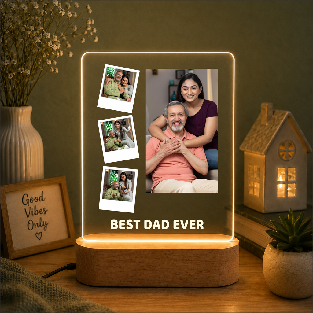 LED acrylic photo frame with three photos and one large portrait, on wood base.