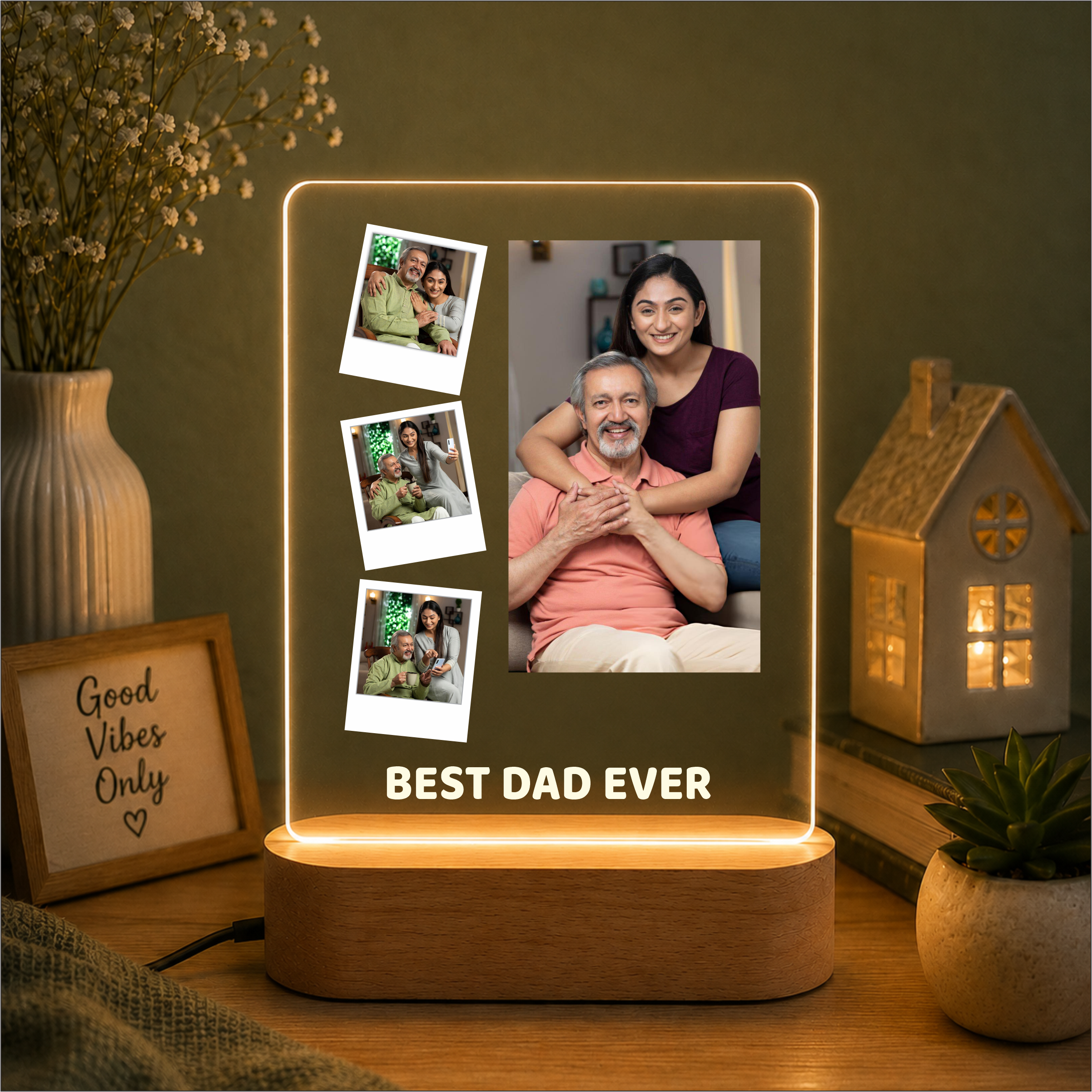 LED acrylic photo frame with three photos and one large portrait, on wood base.
