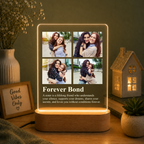 LED acrylic photo frame with four-photo grid and 'Forever Bond' on wooden base